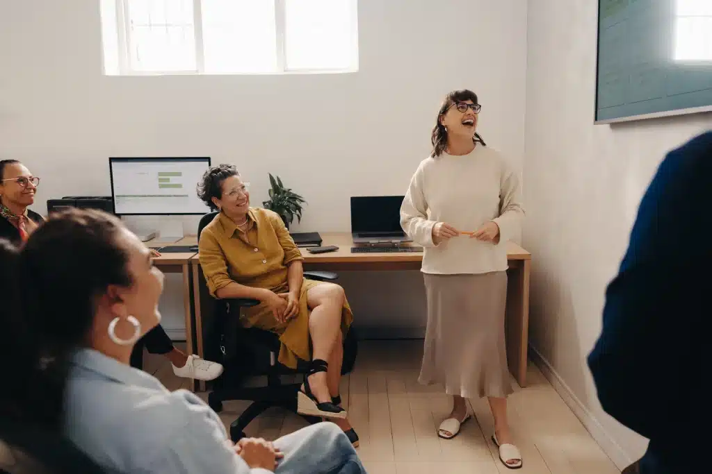 A Team of People Looking at a Screen